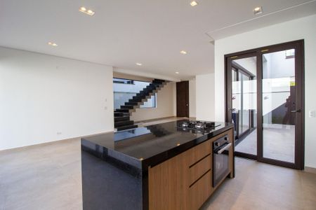 Casa de condomínio para alugar com 210m², 3 quartos e 2 vagasCozinha