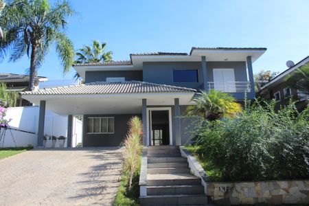 Casa de condomínio para alugar com 295m², 4 quartos e 2 vagasFachada