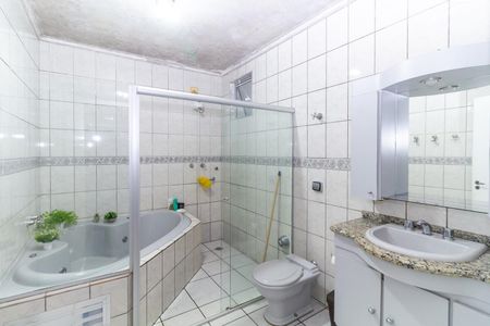 Casa à venda com 220m², 4 quartos e 4 vagasBanheiro 1