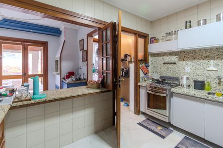 Casa de condomínio à venda com 179m², 3 quartos e 2 vagasCozinha e Área de Serviço