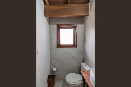 Casa de condomínio à venda com 179m², 3 quartos e 2 vagasBanheiro de Serviço