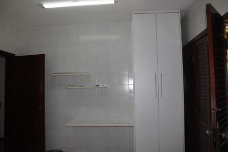 Casa de condomínio para alugar com 390m², 4 quartos e 4 vagasCozinha