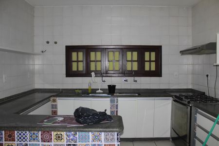 Casa de condomínio para alugar com 390m², 4 quartos e 4 vagasCozinha