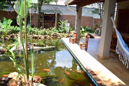 Casa de condomínio para alugar com 600m², 4 quartos e 10 vagasQuintal