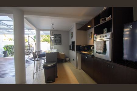 Casa de condomínio à venda com 374m², 5 quartos e 3 vagas Casa de condomínio à venda com 374m², 5 quartos e 3 vagasÁrea comum - Área Gourmet