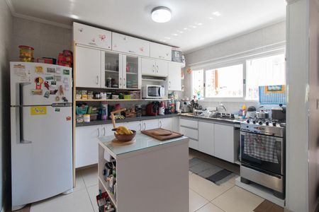 Casa de condomínio à venda com 148m², 3 quartos e 2 vagas Casa de condomínio à venda com 148m², 3 quartos e 2 vagasCozinha e Área de Serviço