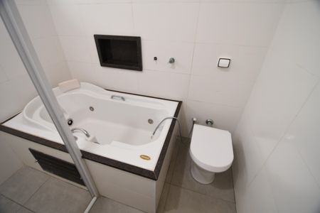 Casa à venda com 234m², 4 quartos e 3 vagasBanheiro Suíte 1