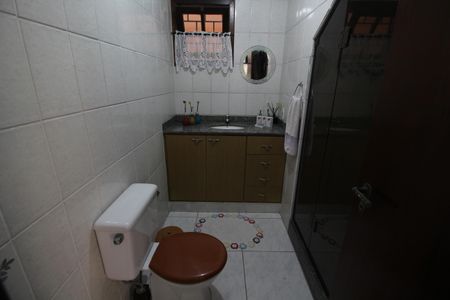 Casa de condomínio à venda com 256m², 4 quartos e 4 vagasBanheiro Social 2