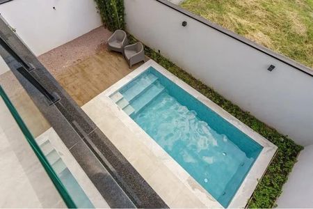 Casa de condomínio à venda com 242m², 3 quartos e 4 vagasÁrea Externa