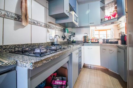 Casa à venda com 87m², 3 quartos e 2 vagasCozinha e Área de Serviço