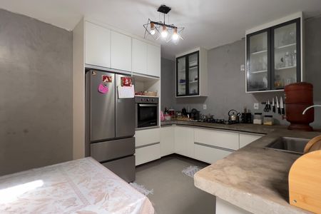 Casa à venda com 146m², 3 quartos e 2 vagas Casa à venda com 146m², 3 quartos e 2 vagasCozinha e Área de Serviço