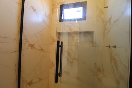 Casa à venda com 329m², 3 quartos e 6 vagasBanheiro da Suíte 2