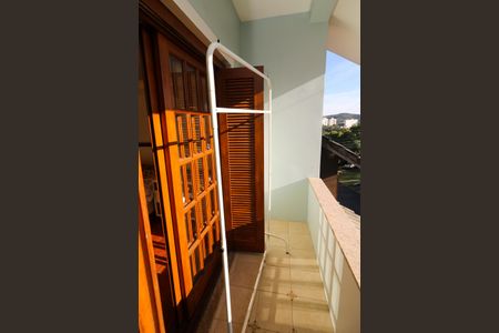 Casa de condomínio à venda com 300m², 4 quartos e 1 vagaSacada do Quarto 1