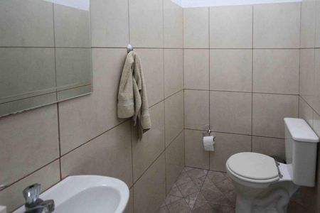 Casa à venda com 540m², 5 quartos e 4 vagasBanheiro da Garagem