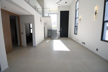 Casa de condomínio à venda com 420m², 5 quartos e 4 vagasSala