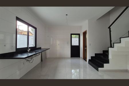 Casa à venda com 77m², 2 quartos e 2 vagas Casa à venda com 77m², 2 quartos e 2 vagasCozinha