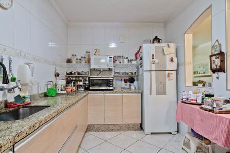 Casa à venda com 100m², 3 quartos e 2 vagas Casa à venda com 100m², 3 quartos e 2 vagasCozinha
