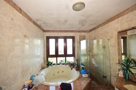 Casa de condomínio para alugar com 816m², 4 quartos e 3 vagasBanheiro Suíte