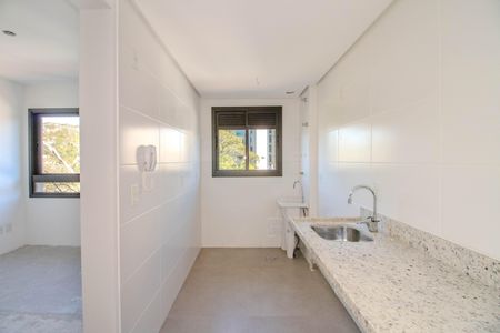 Apartamento à venda com 64m², 2 quartos e 1 vaga Apartamento à venda com 64m², 2 quartos e 1 vagaCozinha e Área de Serviço