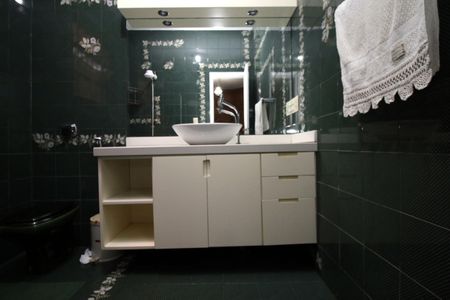 Casa à venda com 433m², 5 quartos e 3 vagasBanheiro da Suíte 1