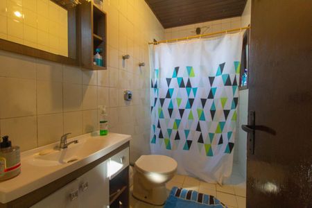 Casa à venda com 243m², 4 quartos e 3 vagasBanheiro 