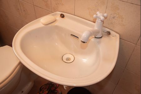 Casa à venda com 320m², 5 quartos e 4 vagasBanheiro de Serviço