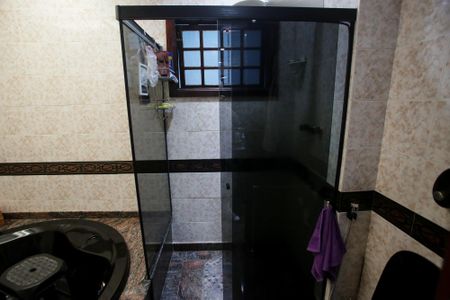 Casa de condomínio à venda com 439m², 6 quartos e 3 vagasBanheiro da Suíte 1
