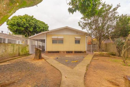 Casa à venda com 70m², 3 quartos e 2 vagas Casa à venda com 70m², 3 quartos e 2 vagasFachada