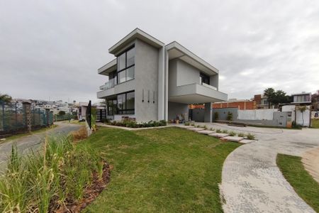 Casa de condomínio à venda com 313m², 4 quartos e 4 vagasFachada