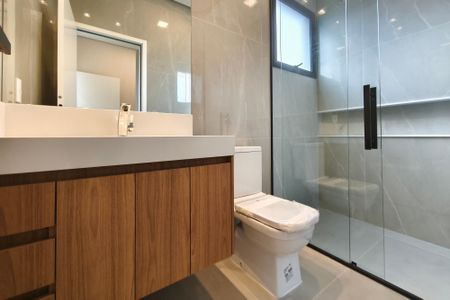 Casa de condomínio à venda com 313m², 4 quartos e 4 vagasBanheiro Suíte 2
