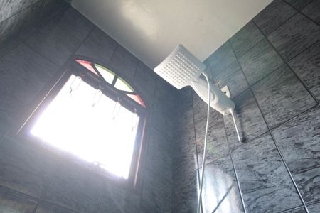 Casa à venda com 411m², 3 quartos e 3 vagasBanheiro da Suite