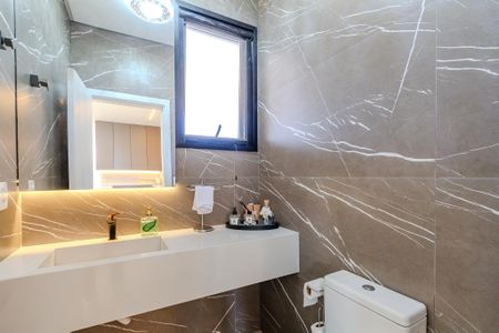 Casa de condomínio para alugar com 344m², 4 quartos e 4 vagasLavabo 1