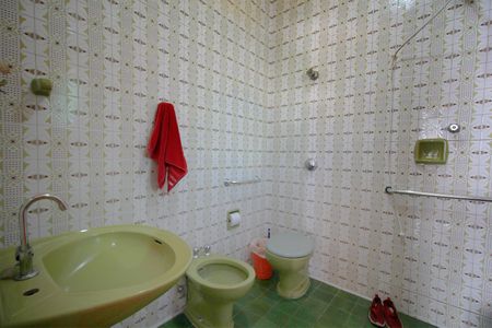 Casa à venda com 320m², 4 quartos e 2 vagasBanheiro da Suíte 1