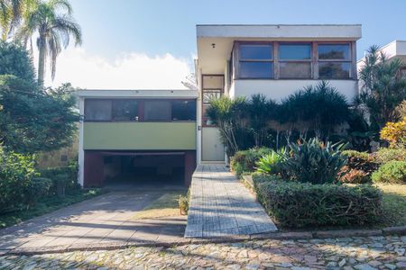 Casa de condomínio à venda com 400m², 4 quartos e 3 vagasFachada
