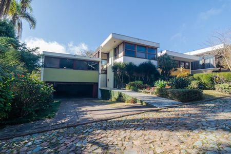 Casa de condomínio à venda com 400m², 4 quartos e 3 vagasFachada