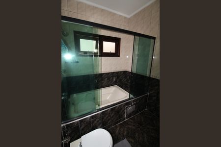 Casa de condomínio para alugar com 380m², 4 quartos e sem vagaBanheiro da Suíte 3