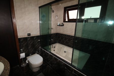 Casa de condomínio para alugar com 380m², 4 quartos e sem vagaBanheiro da Suíte 3