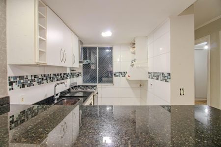 Apartamento à venda com 40m², 2 quartos e 1 vaga Apartamento à venda com 40m², 2 quartos e 1 vagaCozinha e Área de Serviço