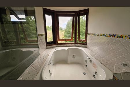 Casa de condomínio à venda com 460m², 4 quartos e 5 vagasBanheiro Suíte 3