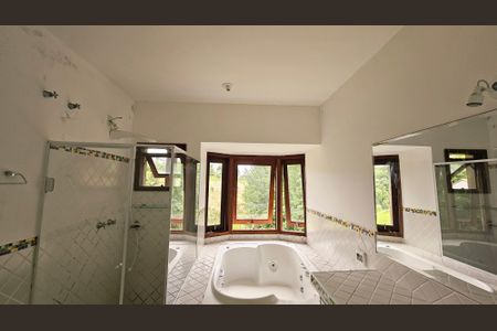 Casa de condomínio à venda com 460m², 4 quartos e 5 vagasBanheiro Suíte 3