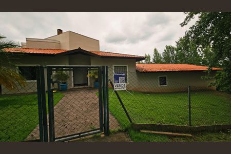 Casa de condomínio à venda com 460m², 4 quartos e 5 vagasFachada