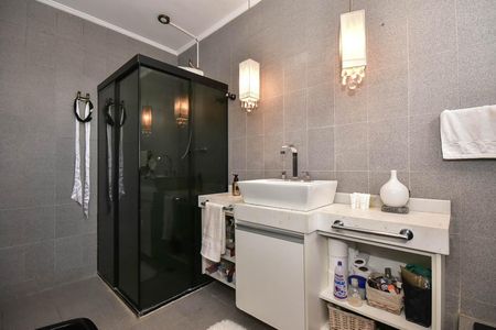 Casa à venda com 518m², 5 quartos e 4 vagasBanheiro Suíte 2