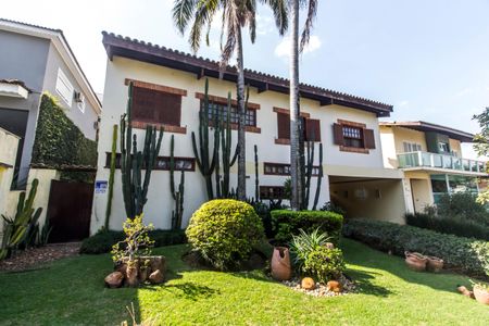 Casa de condomínio à venda com 353m², 4 quartos e 4 vagasFachada