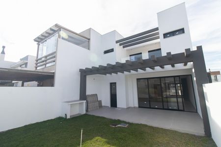 Casa de condomínio à venda com 158m², 3 quartos e 2 vagasQuintal