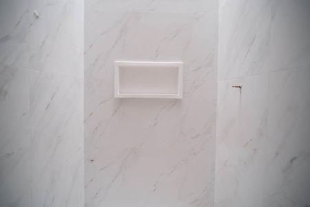 Casa à venda com 79m², 2 quartos e 2 vagasBanheiro da Suíte 2