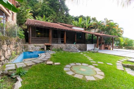 Casa de condomínio para alugar com 250m², 5 quartos e 2 vagasFachada