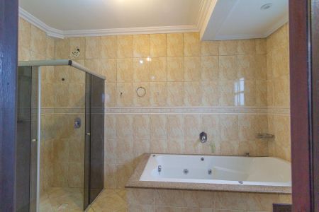 Casa à venda com 460m², 4 quartos e 2 vagas Casa à venda com 460m², 4 quartos e 2 vagasBanheiro da Suíte