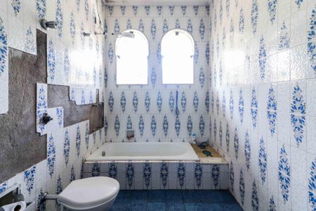 Casa para alugar com 400m², 3 quartos e 4 vagasBanheiro da Suíte 1