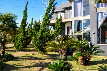 Casa de condomínio para alugar com 490m², 5 quartos e 4 vagasFachada