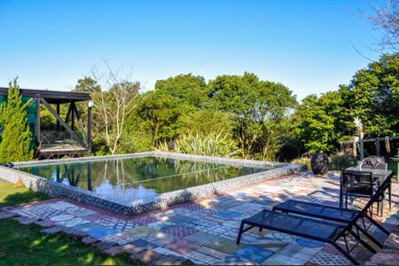 Casa de condomínio para alugar com 490m², 5 quartos e 4 vagasÁrea Externa